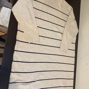 Abbott Elementary women’s long sleeve striped sweater dress